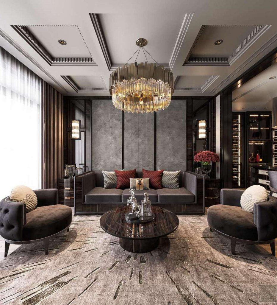 Không gian phòng khách được thiết kế với gam màu trầm sang trọng.